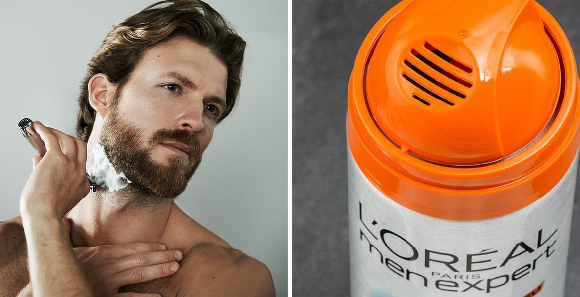 Mann mit Rasierapparat und Aftershave